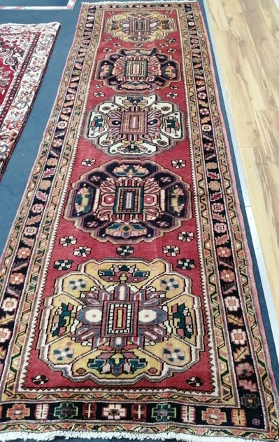 A Karajeh runner, 330 x 105cm